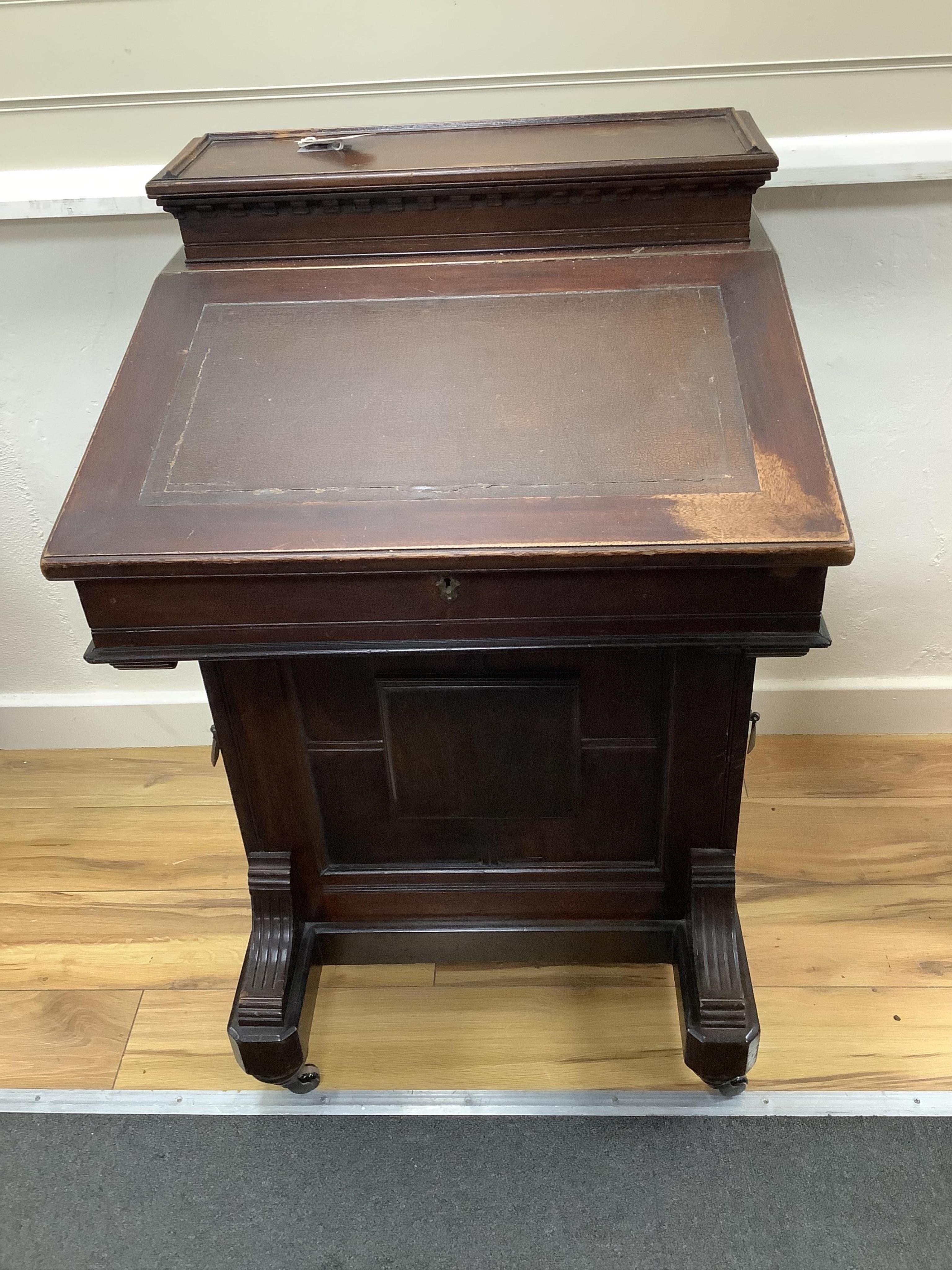 A late Victorian mahogany davenport, width 55cm, depth 56cm, height 93cm. Condition - fair